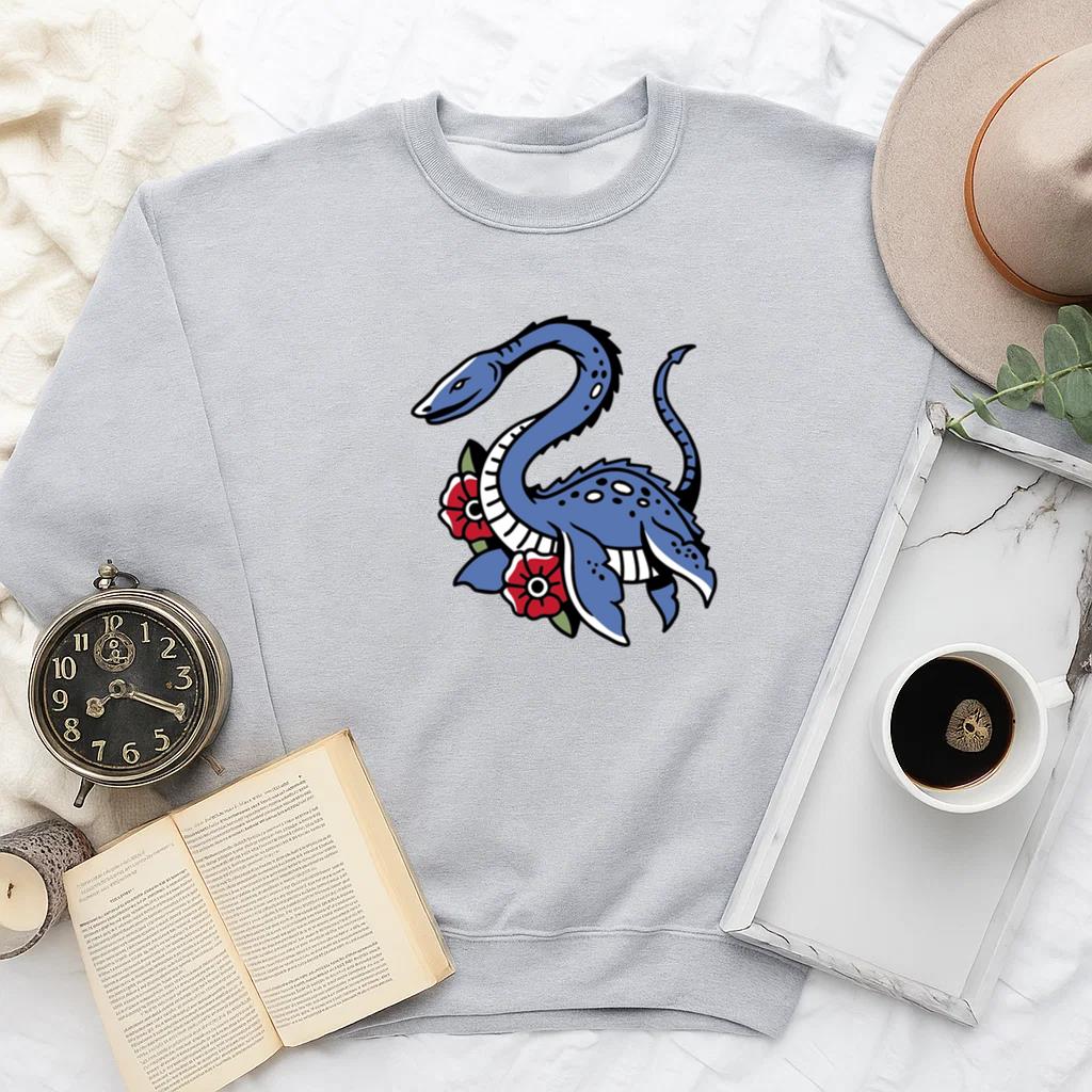 Whimsical Blue Sea Creature Illustration With Floral Accents Sweatshirt